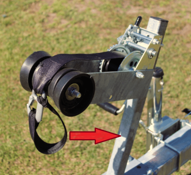 Small trailer bow support area showing winch stand post, bow roller, and winch hardware