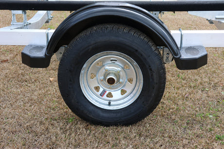 14 inch 5 lug galvanized trailer wheel mounted on EZ Loader boat trailer showing corrosion resistant finish