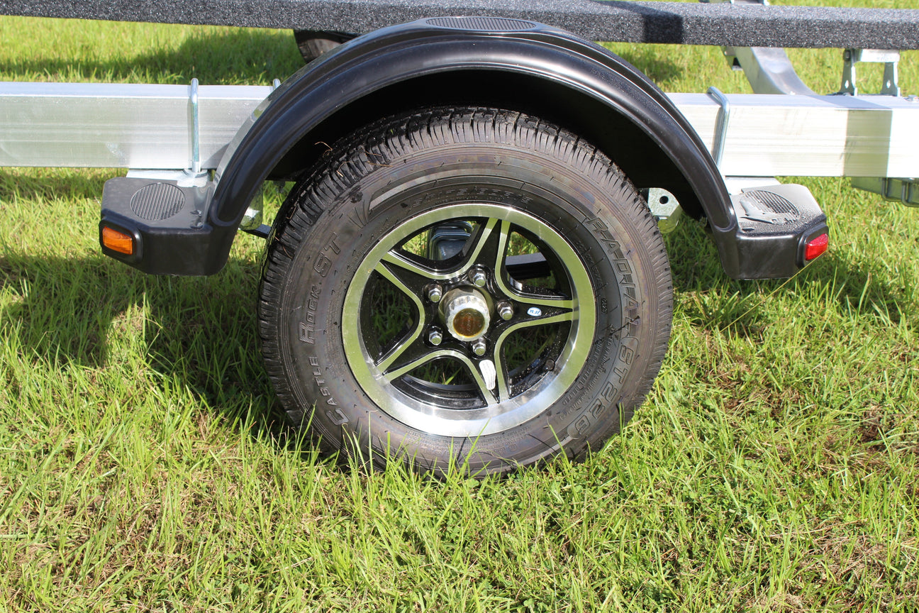 aluminum trailer wheel mounted on EZ Loader boat trailer showing 5 lug design and lightweight finish