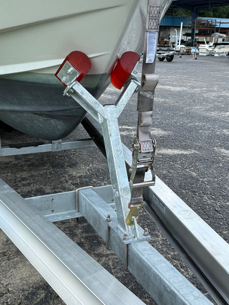 EZ Loader trailer bow stop V-stop mounted on winch stand guiding boat bow into position
