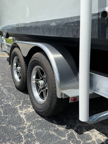 EZ Loader trailer strap guide installed at rear showing upright guide-on system for boat alignment