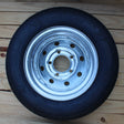 ST145/40R12 Load Range D tire and 5-lug galvanized trailer wheel assembly