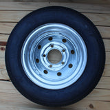 ST145/40R12 Load Range D tire and 5-lug galvanized trailer wheel assembly