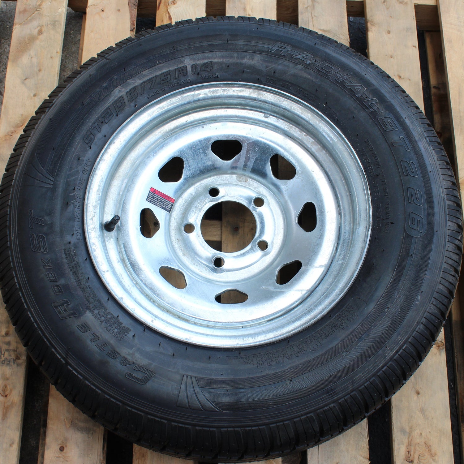 Load Range D tire and 5-lug galvanized wheel assembly