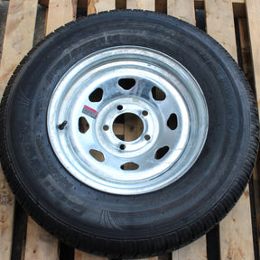 Load Range D tire and 5-lug galvanized wheel assembly