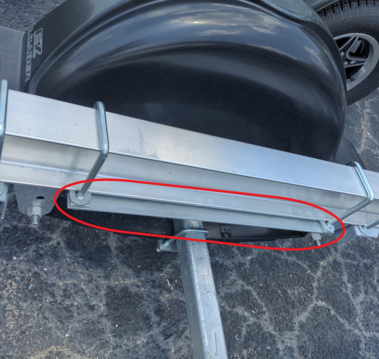 Galvanized spring hanger strap for EZ Loader leaf spring suspension