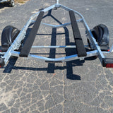 EZ Loader galvanized front and rear crossmembers.  supporting bunk brackets for hull-support carpeted bunks on a boat trailer frame