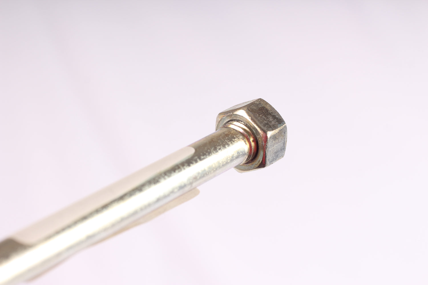 EZ Loader 1/2-13 x 25-3/4 hex head through bolt showing smooth shank and head for roller tray and bunk mounting

