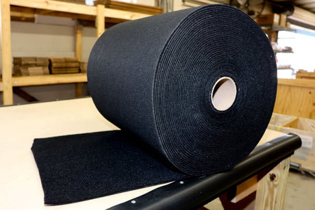 Detailed view of EZ Loader bunk carpet edge thickness and plush cushioning that protects aluminum and fiberglass hulls