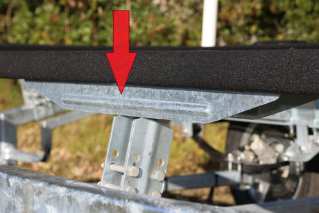 Galvanized channel mounting plate with teardrop tiedown opening
