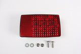 Rear view of EZ Loader 250-032136 LED tail light and mounting hardware