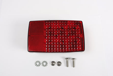 Rear view of EZ Loader 250-032136 LED tail light and mounting hardware