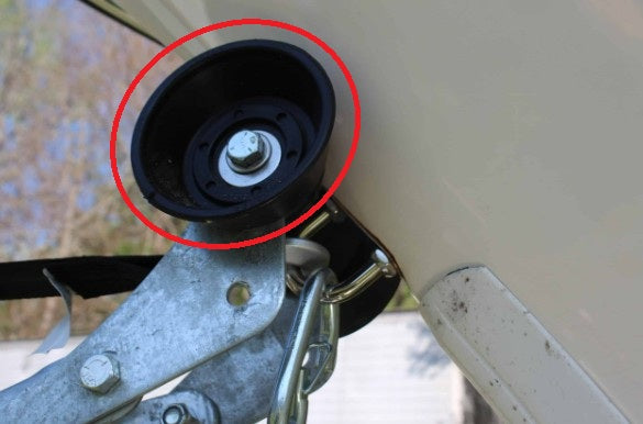 Boat trailer bow roller bell ends used outside the main bow roller